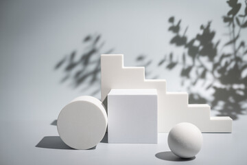 Abstract minimalistic scene with geometric forms. podium on white background with shadows. product...