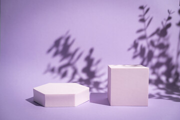 Abstract minimalistic scene with geometric forms. podium on purple background with shadows. product...