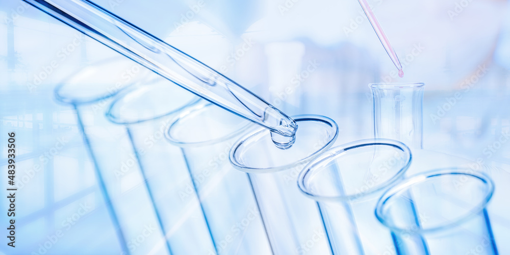 Wall mural pipette and test tubes with laboratory scene in background