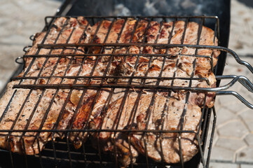 meat is fried on the grill