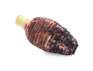 Taro root on old wooden background.