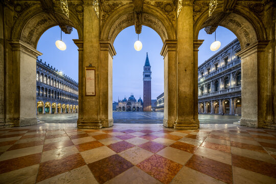 Piazza San Marco at dusk with view of St Mark's Basilica and Campanile tower, Venice, Italy