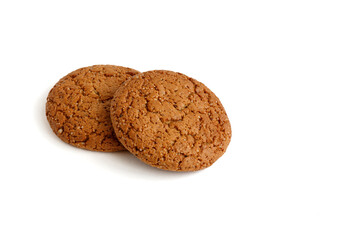 Oatmeal cookies are isolated on a white background.