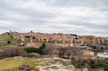 Fototapeta na wymiar Landscape of the city of Avila surrounded by its UNESCO World Heritage city wall.