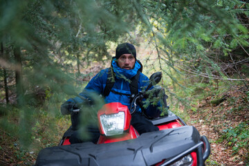 Rescuer on a Quad Bike Searching Missing Person