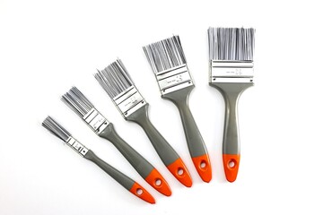 Set of paint brushes on white background.