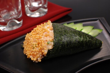 Salmon fish Temaki in black background