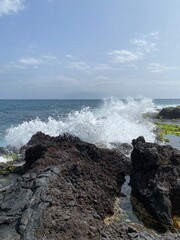 waves crashing on rocks