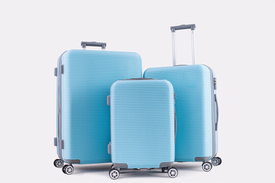 3 Blue  Suitcases Isolated On White Background Vacation Luggage