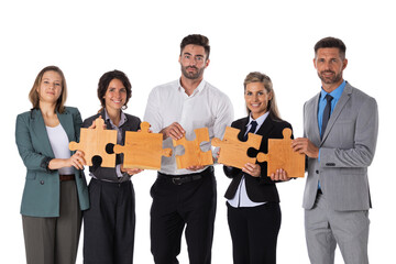 Business people assembling jigsaw puzzle