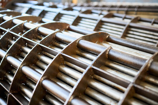 Heat exchangers tube bundle details of industrial heat exchanger shell and tube condenser, made of steel with corrosion. Abstract industrial background of carbon steel heat exchanger tube bundles.