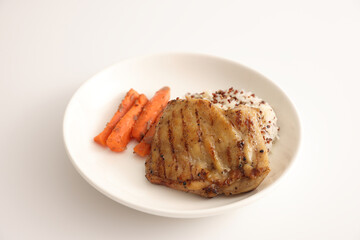 Grilled chicken with rice isolated in white background