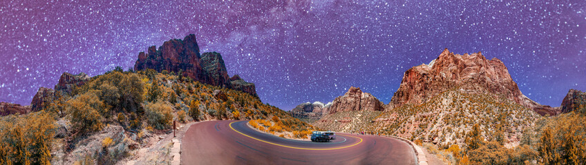 Starry night over Zion National Park windy road, Utah.