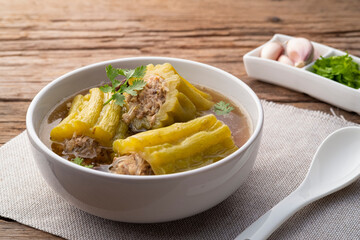 Stuffed bitter gourd with seasoned minced pork soup and Glass Noodles (Gang Jeud Mara Sai Moo).Selective focus