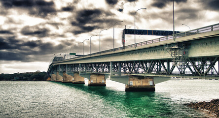 Auckland Harbour Bridge on a cloudy  day, New Zealand
