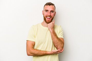 Young caucasian man isolated on white background smiling happy and confident, touching chin with hand.