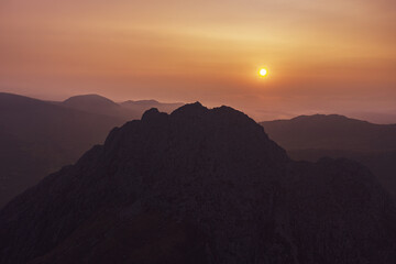 Snowdonia National Park sunrise aerial view of Tryfan mountain 