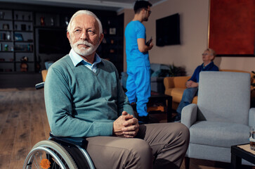 Portrait of senior man in wheelchair at nursing home.