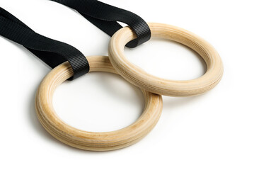 Wooden gymnastic rings isolated on white background.