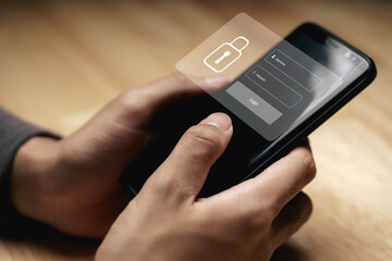 Businessman protecting personal data on the smartphone with Login virtual interfaces. Lock icon and internet network security technology. Cybersecurity and privacy concepts.