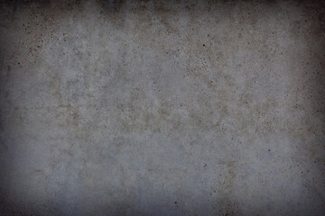 fragment of an old brick wall with concrete plaster and remnants of multicolored paint, grunge,...