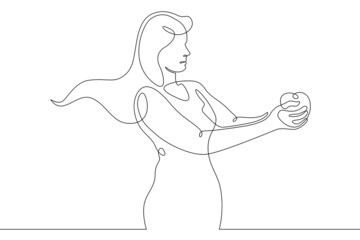 One continuous line.A young woman chooses vegetables and fruits. The female character is shopping for groceries.Buyer with food products.Continuous line drawing.Line Art isolated white background.