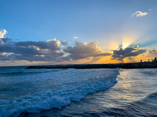 Sunset at the sea, vivid clouds, sea horizon, twilights
