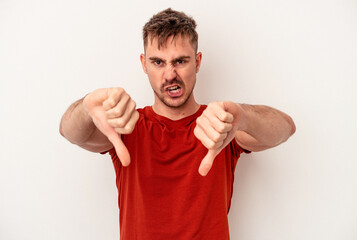 Young caucasian man isolated on white background keeping eyes opened to find a success opportunity.