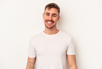 Young caucasian man isolated on white background points down with fingers, positive feeling.