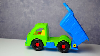 children's car, dump truck, bright different colors of parts 