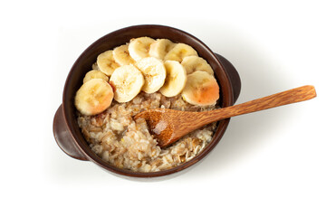 Healthy breakfast. oatmeal with bananas isolated on white background