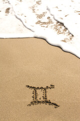 Horoscope signs on sand. 