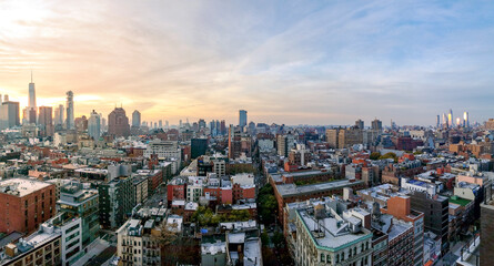 New York City panoramic skyline view as dusk falls on the buildings of Manhattan