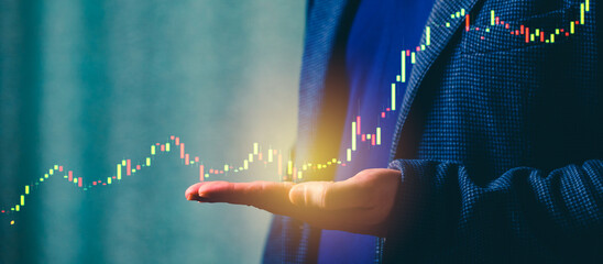 a successful investor, trader, manipulates the direction of the price of stocks, securities, the concept of investment and management, a close-up of the trader's hands