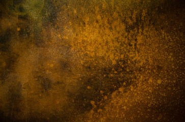 Rusty wall background. Natural rust is yellow-brown in color.