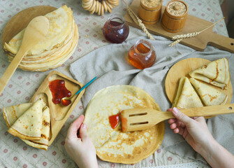 Pancakes. Carnival celebration. Maslenitsa food. National dish. Traditional meal. Homemade bakery. Gluten free. Kitchen. Rustic style. Russian culture 
