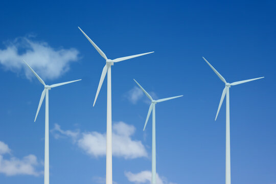 Wind turbines against the blue sky