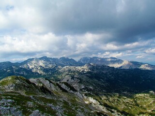 Panoramic view of mountains in the Julian alps and Triglav national park in Gorenjska, Slovenia with clouds in the sky