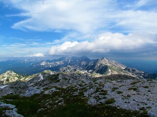 View of mountains in Julian alps and Triglav national park, Slovenia with clouds in the sky