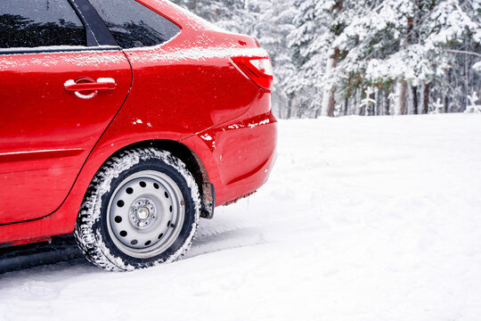 Red Car In Winter Snow Forest