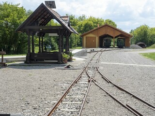 Fototapeta na wymiar old and restored narrow gauge train in Almamellek in Hungary