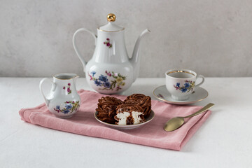 French morning tea party with homemade gourmet marshmallows on a light background, soft pink textile