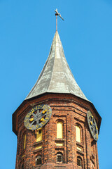 Fototapeta na wymiar Clock on the tower of the Kaliningrad Cathedral