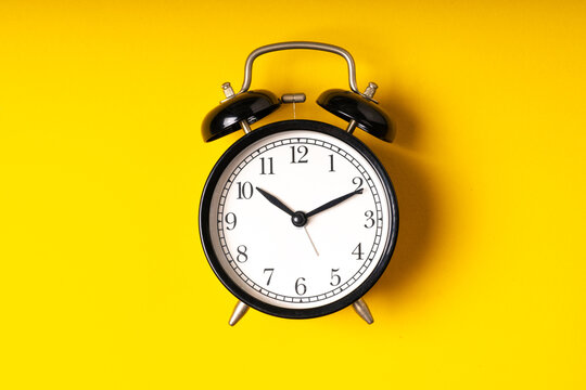 Clock from top view with time concept.