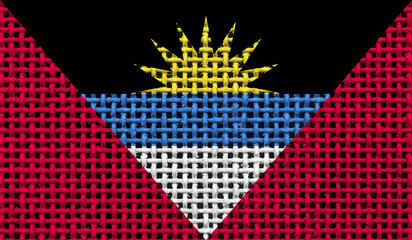 Antigua and Barbuda flag on the surface of a metal lattice. 3D image