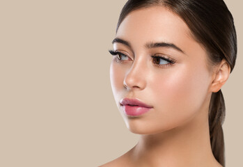 Fototapeta premium Beautiful freckles woman healthy skin, hair brunette hairstyle concept. Color background. Brown