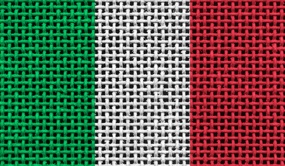 Italy flag on the surface of a metal lattice. 3D image
