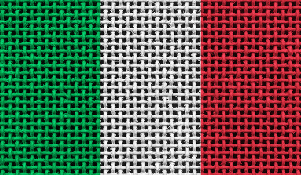 Italy flag on the surface of a metal lattice. 3D image