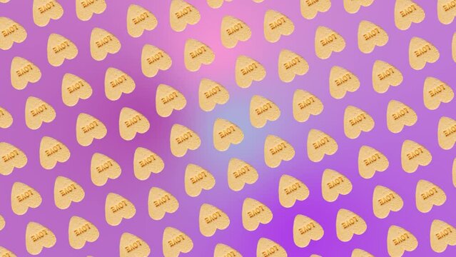 A nice colorful  3 in 1 animation: a different sides and size animations for 10 sec pattern made of heart-shaped yellow candies with label "Love", on trending purple multi colored animated background.