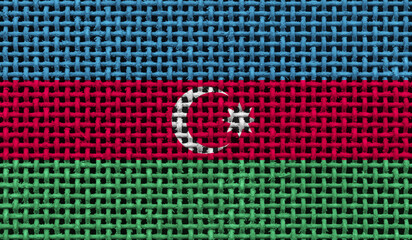 Azerbaijan flag on the surface of a metal lattice. 3D image